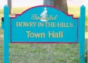  ??  ?? The Town Hall sign is pictured in Howey-in-the-Hills.