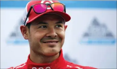  ?? THE ASSOCIATED PRESS ?? Kyle Larson smiles after qualifying Friday for Sunday’s NASCAR Cup auto race at the New Hampshire Motor Speedway.