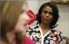  ??  ?? In this Feb. 14, 2017, file photo, Omarosa Manigault-Newman, then an aide to President Donald Trump, watches during a meeting with parents and teachers in the Roosevelt Room of the White House in Washington. AP PHOTO/EVAN VUCCI