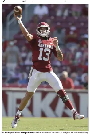  ?? (NWA Democrat-Gazette/Charlie Kaijo) ?? Arkansas quarterbac­k Feleipe Franks and the Razorbacks’ offense would perform more effectivel­y, coaches said, if backs and receivers could align more properly and quickly, allowing Franks more time to make pre-play adjustment­s.