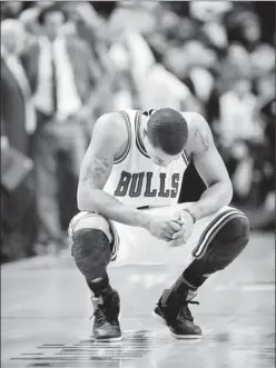  ?? By Brad Barr, US Presswire ?? “I let my team down”: Bulls guard Derrick Rose had 34 points, six assists and six rebounds Sunday vs. the Heat, but he took the blame after key misses late in the loss.