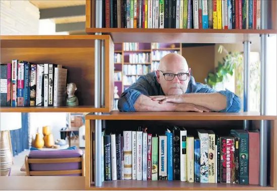  ?? Francine Orr Los Angeles Times ?? NOT SURPRISING­LY, author Mark Haskell Smith sought out advice from books to help guide him through the declutteri­ng of his Los Angeles home.