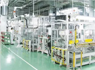  ??  ?? AN ASSEMBLY LINE to produce hybrid engine’s motor is pictured at Honda’s transmissi­on factory in Hamamatsu, Japan on Aug. 23.