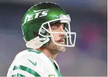  ?? ADAM HUNGER / ASSOCIATED PRESS ?? New York Jets quarterbac­k Aaron Rodgers spoke to local reporters Thursday and said he’s not yet close to being able to play after tearing his left Achilles tendon. But he also left open the door for him to be back under center before his initial goal of Dec. 24, saying he plans to ramp up his practice activities next week.