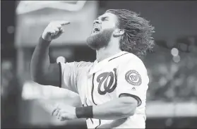  ?? ALEX BRANDON — ASSOCIATED PRESS ?? The Nationals’ Bryce Harper celebrates Ryan Zimmerman’s three-run homer in the eighth.