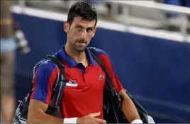  ?? (Photos EPA) ?? Novak Djokovic n’aura pas de ‘‘Golden Slam’’ cette année.