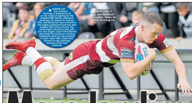  ??  ?? WINGING IT: Liam Marshall touches down for the winning try