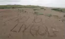  ?? Photograph: Tom Jenkins/The Guardian ?? A protest against LIV Golf on the beach at St Andrews during the 2022 Open there.