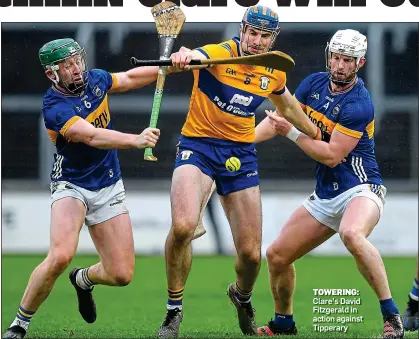  ?? ?? TOWERING: Clare’s David Fitzgerald in action against Tipperary