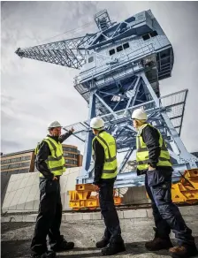  ??  ?? Former crane operators Tony Forde, Liam O’Brien and Paddy Paisley at last year’s unveiling by the Dublin Port Company of Crane 292, a restored 1960s crane. Investing in ports and other infrastruc­ture is key to sustaining Ireland’s exports post-Brexit