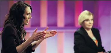  ?? PHOTO: REUTERS ?? Taxing debate . . . Jacinda Ardern and Judith Collins in a TVNZ debate last month.