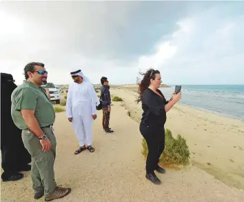  ?? Pankaj Sharma/Gulf News ?? A team from Ramsar Convention with Maral Khalid Chreiki, principal nature conservati­on specialist, Dubai Municipali­ty (second left) at Jebel Ali Wetland Sanctuary in Dubai on October 30.