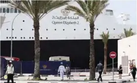  ??  ?? The Queen Elizabeth II luxury cruise liner, also known as the QE2, is seen docked at Port Rashid in Dubai.