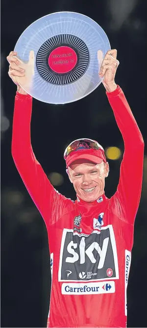  ??  ?? ON TOP OF THE WORLD: Britain’s Chris Froome of Team Sky