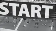  ?? Helen H. Richardson, Denver Post file ?? Racers stand at the start of the 35th annual Cherry Creek Sneak on April 23.