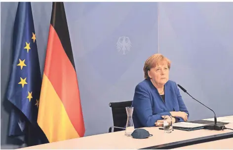  ?? FOTO: FILIP SINGER/DPA ?? Bundeskanz­lerin Merkel forderte in der digitalen Konferenz internatio­nale Solidaritä­t und warb für das Mittel der Co2-bepreisung.