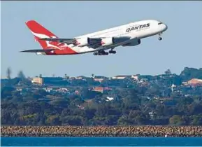  ?? REUTERS PIC ?? Qantas Airways regained its investment-grade status from Moody’s Investors Service last year and from Standard & Poor’s in 2015 after slipping into junk territory in 2013.