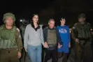  ?? Israel. Photograph: AP ?? Natalie Raanan, Israeli hostage envoy Gal Hirsch and Judith Raanan, arriving in