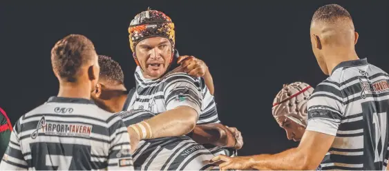  ?? Picture: GLENN CAMPBELL ?? Mathew Goodjoy (headgear) leading a Brothers scrum against South Darwin at Territory Rugby League Stadium last night.