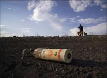  ?? JOHN LOCHE—ASSOCIATED PRESS ?? A buoy sits above the waterline at the Lake Mead National Recreation Area, Friday, Aug. 13, 2021, near Boulder City, Nev. Water levels at Lake Mead, the largest reservoir on the Colorado River, have fallen to record lows.