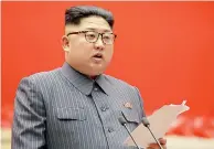  ??  ?? This picture taken Dec 21, released by North Korea's official Korean Central News Agency (KCNA) shows North Korean leader Kim Jong-Un delivering his speech during the opening of the 5th Conference of Cell Chairperso­ns of the Workers' Party of Korea in...
