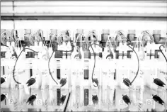  ??  ?? An automated fermenting machine is seen at the Ginkgo Bioworks Inc. facility.