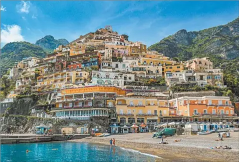  ?? GETTY ?? Italy’s Amalfi Coast is one of Backroads’ most popular trips. It stretches from Positano to Vietri sul Mare and features colorful cliffside buildings.