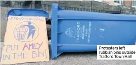  ??  ?? Protesters left rubbish bins outside Trafford Town Hall