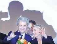  ?? MICHAEL PROBST/ASSOCIATED PRESS ?? French presidenti­al candidate Marine le Pen, right, and Dutch populist lawmaker Geert Wilders stand together after their speeches in Koblenz, Germany, Saturday.