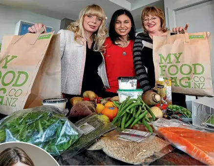  ?? STUFF ?? My Food Bag founders, from left, Cecilia Robinson, Nadia Lim and Theresa Gattung. Left, Spark chair Justine Smyth and, below, Food and Grocery Council chief executive Katherine Rich, who was called ‘‘perky’’ by the MC after delivering a major business speech.