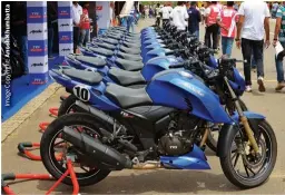  ??  ?? The race-ready bikes lined up outside the pit