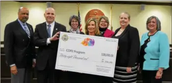  ?? SUBMITTED PHOTO ?? Chester County officials and senior staff at the announceme­nt of funds raised by the 2017 Chester County Color 5K. From left to right are: Commission­er Terence Farrell, District Attorney Tom Hogan, Health Director Jeanne Casner, Commission­er Michelle...