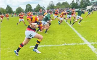  ?? ?? Waikato Legends’ Damian Karauna makes a break against the South African Buffalos.