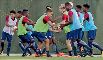  ?? — PTI ?? England players at a tune-up session in Kolkata on Wednesday. They face Chile on Sunday.