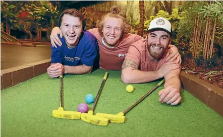  ?? MARK TAYLOR/STUFF ?? Kyle Stucliffe, John Middleton and Zac Roberts have been mini putting their way around New Zealand raising money for the Mental Health Foundation.