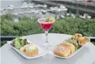  ??  ?? The moist and chunky salmon tartare, terrasse-ready lobster rolls and a summery raspberry margarita.