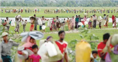  ??  ?? Many Rohingya refugees express fear of returning to a country where they saw their relatives murdered by soldiers and vigilantes who drove them from their homes with bullets and arson.