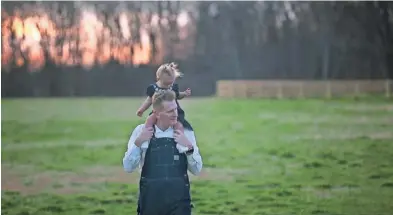  ?? RORY FEEK ?? Rory Feek with daughter Indiana. Feek’s new book, “Once Upon a Farm: Lessons on Growing Love, Life, and Hope on a New Frontier,” looks at how the two are faring.