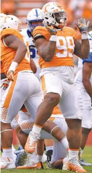  ?? STAFF PHOTO BY ROBIN RUDD ?? Tennessee’s Kahlil McKenzie Jr. (99) celebrates a tackle that held Indiana State on fourth down.