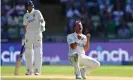  ?? Photograph: Clive Mason/Getty Images ?? Neil Wagner picks up the wicket of Ollie Pope as England captain Joe Root looks on ruefully.