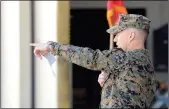  ??  ?? MCDONALD ADDRESSES MARINES in the Marine Attack Squadron 311 (VMA-311) during the ceremony.