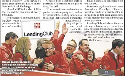  ??  ?? Renaud Laplanche, head of LendingClu­b, embraces company honcho Carrie Dolan as shares go on sale at New York Stock Exchange Thursday.