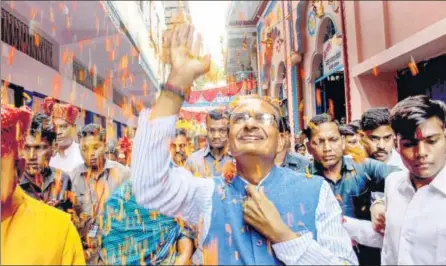  ?? PTI PHOTO ?? Shivraj Singh Chouhan has travelled throught out the state touching people’s feet, greeting them with folded hands, capitalisi­ng on his mama (uncle) image.