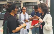  ?? PBS ?? Actor Lily Tomlin (right) campaigns for a fair wage for restaurant workers in “Waging Change.”