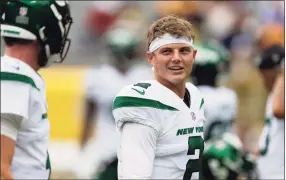  ?? Matt Ludtke / Associated Press ?? Jets quarterbac­k Zach Wilson has impressed both coaches and teammates with his preparatio­n.