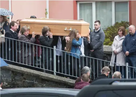  ??  ?? Mourners at the funeral of Darragh Killeen at Inch Church, Co Clare, on Saturday. The 19-year-old and his cousin Oisín Cahill (18) died following a crash in the early hours of Easter Sunday