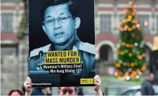  ?? — Reuters ?? Public outcry: People protesting against Myanmar’s military outside the ICJ in
The Hague, Netherland­s last December.