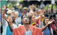  ?? Picture: AFP / STR ?? DIVINE INTERVENTI­ON: Participan­ts in a ‘Breakthrou­gh prayer for Zimbabwe’ gathering pray at Harare’s Unity Square yesterday