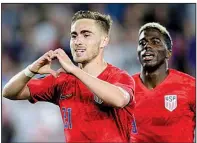  ?? AP/ANDY CLAYTON-KING ?? Tyler Boyd (left) and his U.S. men’s teammates, who are playing in the CONCACAF Gold Cup, have also been following the U.S. women in the World Cup. “They have our full support,” defender Tim Ream said.