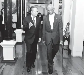  ??  ?? China’s State Councilor and Minister of Foreign Affairs Wang Yi speaking with President David Granger at State House yesterday. (Ministry of the Presidency photo)